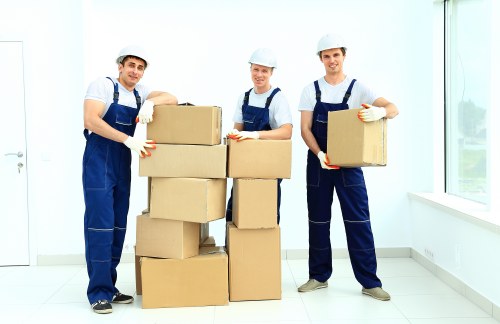 Student removals team helping with boxes in a Twickenham residential move