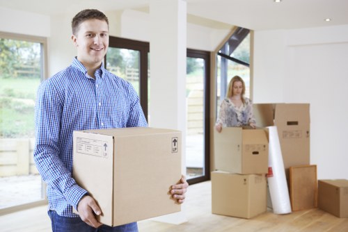 Office relocation planning in Twickenham with business equipment and packing materials