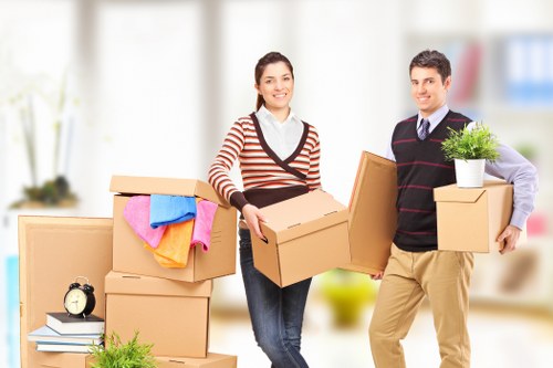 Moving furniture down stairs during a Twickenham flat removal