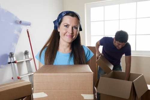 Twickenham student move with boxes, desk, and household items being unloaded