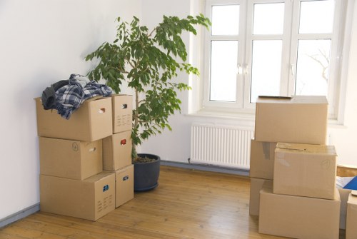 Professional movers loading office items for a local commercial move