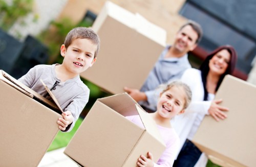 Local moving team handling boxes and furniture in Twickenham