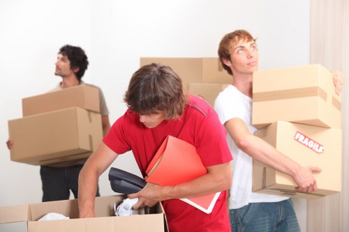 Businesses preparing for an office move in Twickenham with organised labels and crates