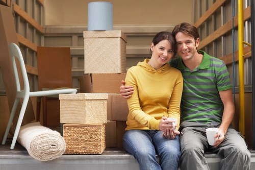 Unpacking support helping a family settle into a Twickenham property