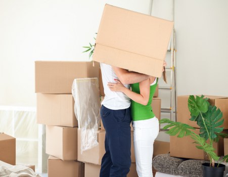 House removal team planning a move in a Twickenham residential street