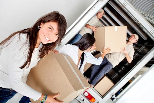 Local office moving team handling furniture and boxes in Twickenham