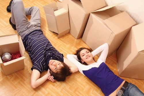 Removal van outside a Twickenham flat with boxes ready to move
